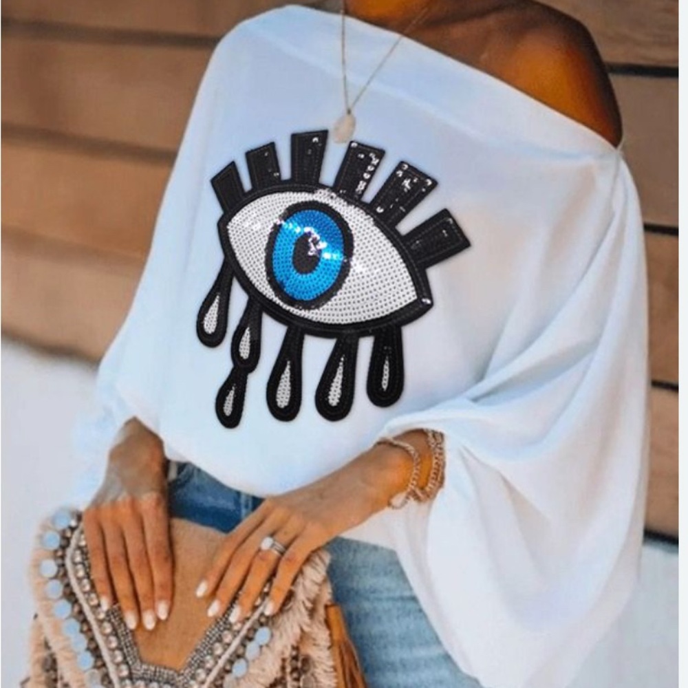 Stylish Off-Shoulder White Blouse with Eye Design